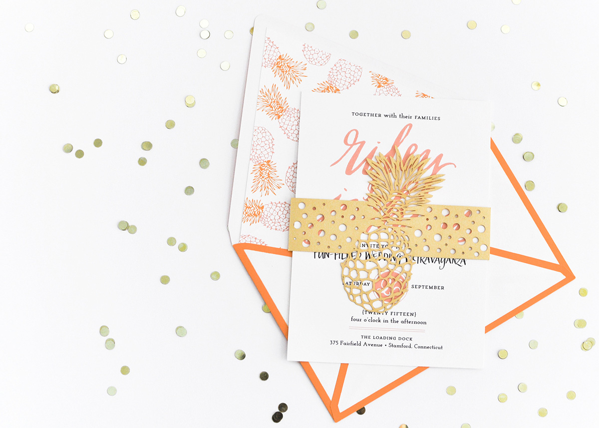 Palm Beach inspired pink and orange pineapple wedding invitation